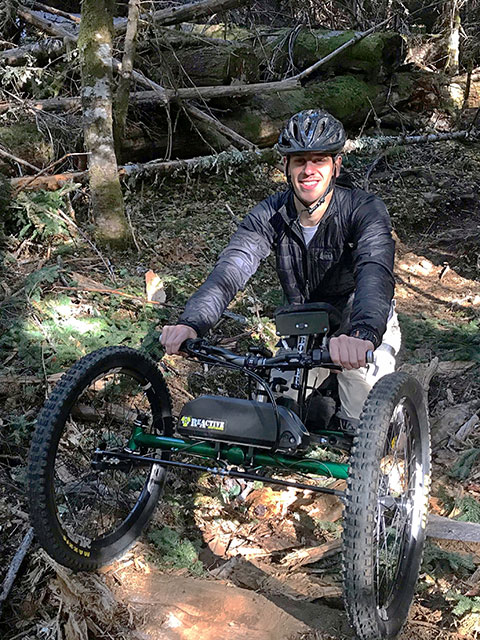 Trevor Denning in off-road wheelchair the forest