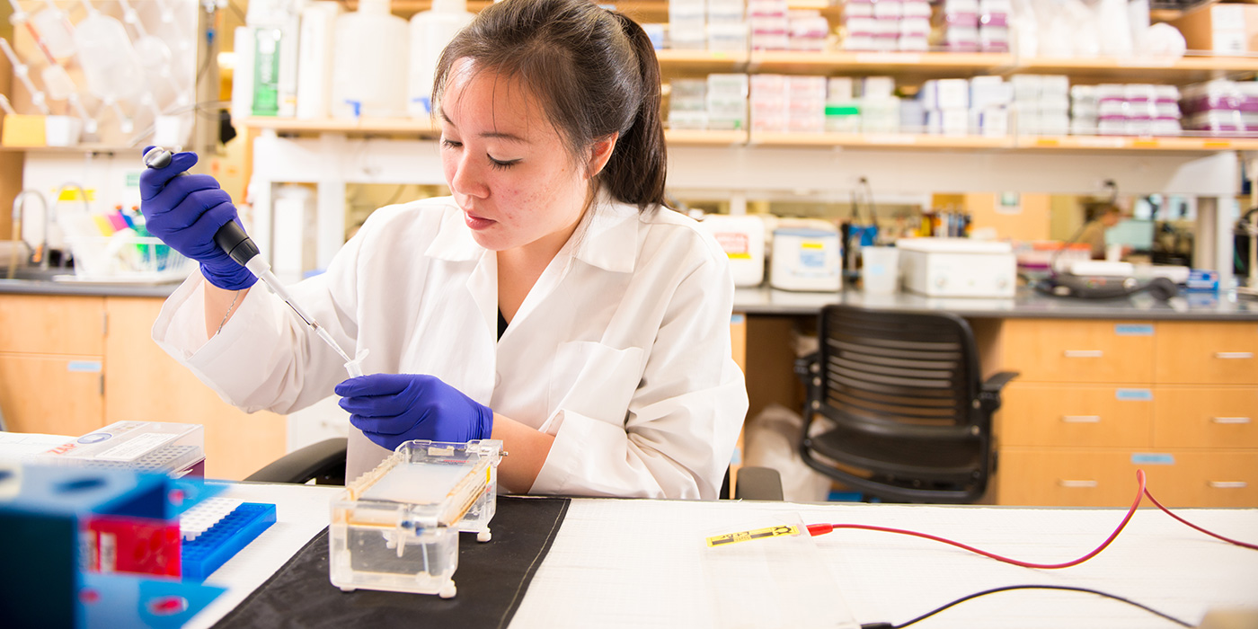 student in research lab