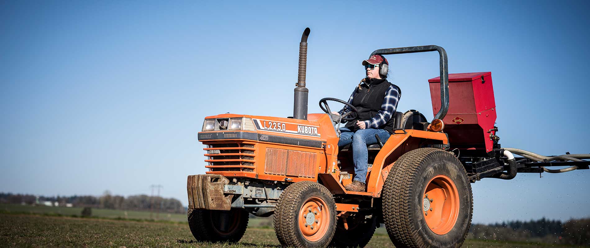 person driving a tractor