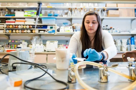 student in research lab