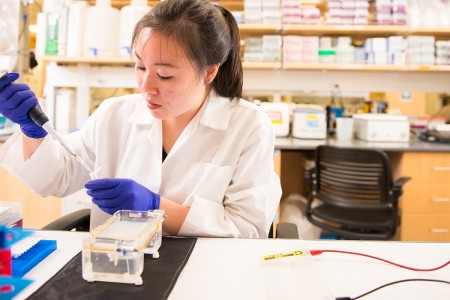 student in research lab